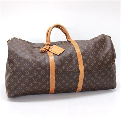 louis duffle bag fake|authentic louis vuitton duffle bag.